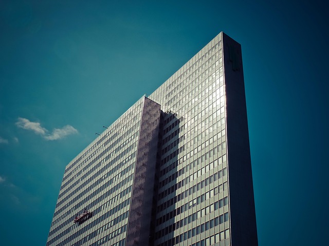 minimalist luxury penthouse building with glass balconies and sleek facade downtown Montreal